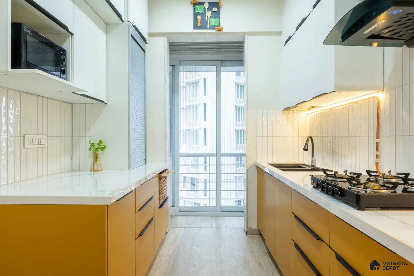 Modern parallel kitchen with mustard yellow laminate, white quartz countertop, and vertical white subway backsplash tiles in Bengaluru | Material Depot
