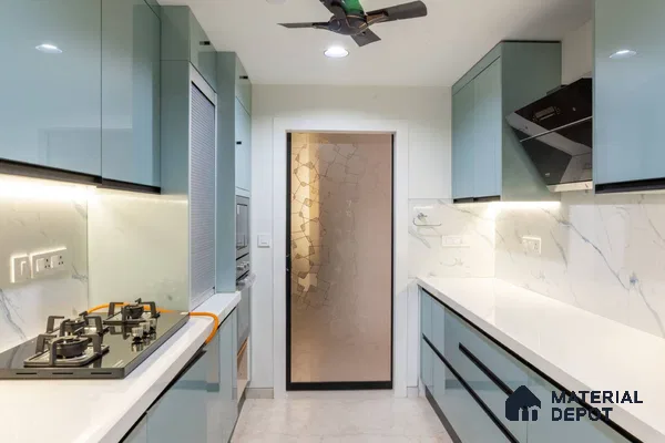 Modern parallel kitchen with pastel blue high gloss laminate, white quartz countertop, and marble-look backsplash in Bengaluru | Material Depot