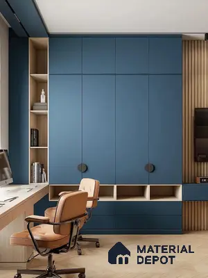 Modern study room with matte blue laminate cabinetry, oak wood open shelving, and herringbone wooden flooring | Material Depot