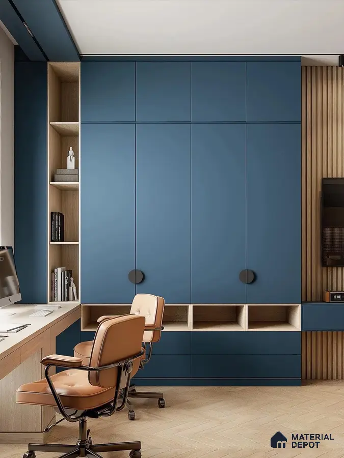 Modern study room with matte blue laminate cabinetry, oak wood open shelving, and herringbone wooden flooring | Material Depot