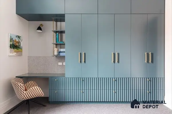 Modern study room with matte teal solid color laminate wardrobe and fluted laminate drawers | Material Depot