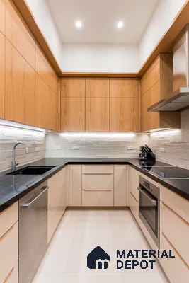 Modern U-shaped kitchen with light oak wood laminate, beige solid color laminate, and black granite countertop in Bengaluru | Material Depot