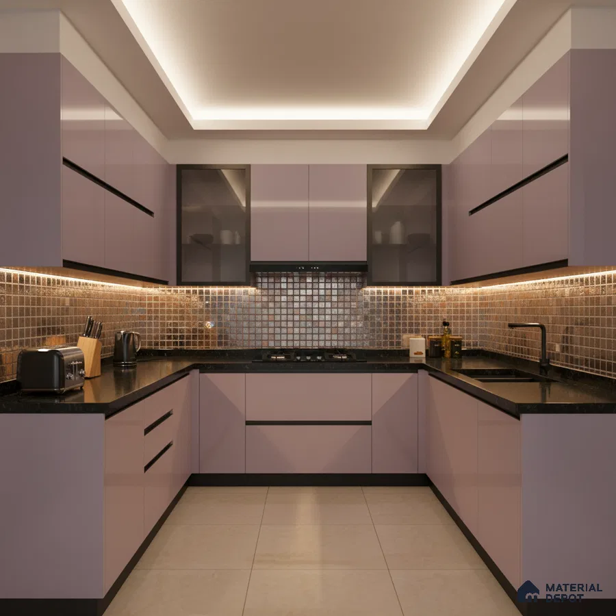 Modern U-shaped kitchen with pastel mauve laminate, black granite countertop, and metallic mosaic backsplash tiles in Bengaluru