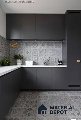 Modern utility room with matte charcoal laminate cabinets, white quartz countertop, and grey patterned moroccan tiles in Bengaluru | Material Depot