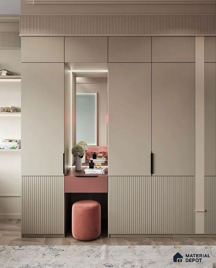 Modern wardrobe with beige fluted laminate, blush pink vanity, and chevron wooden flooring | Material Depot