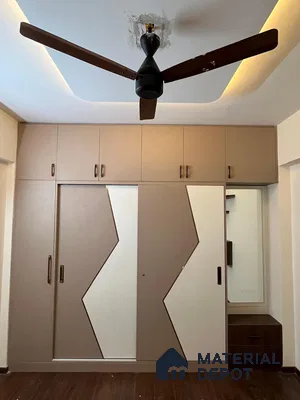 Modern Wardrobe with Bold Geometric brown Accents in Bengaluru | Material Depot