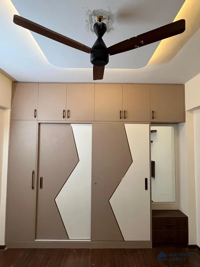 Modern Wardrobe with Bold Geometric brown Accents in Bengaluru | Material Depot