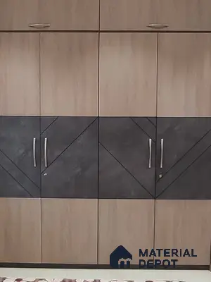 Modern wardrobe with light oak laminate and matte charcoal geometric laminate panels | Material Depot