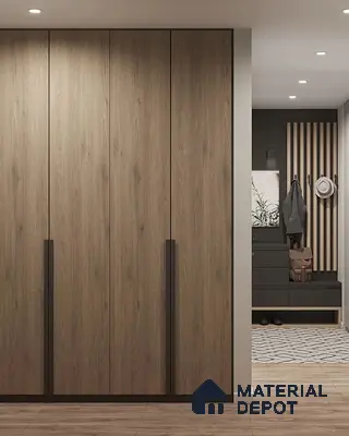 Modern wardrobe with oak wood laminate shutters and black accent handles in entryway | Material Depot
