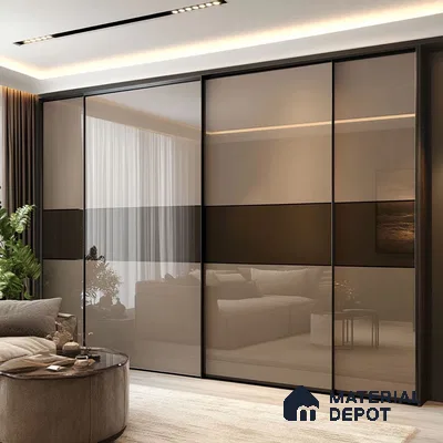 Modern wardrobe with taupe glass sliding shutters and matte black profiles in bedroom | Material Depot
