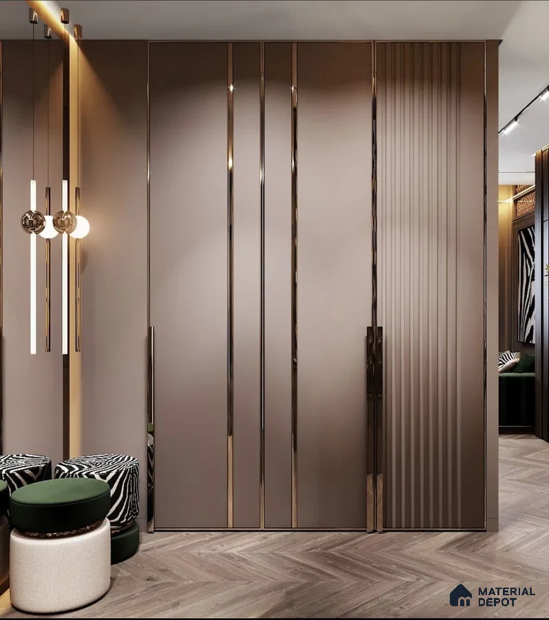 Modern wardrobe with taupe high gloss laminate, bronze metallic profiles, and herringbone wooden flooring | Material Depot