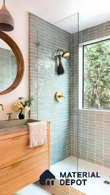 Natural Light Shower with Soft Blue Tiles and Brass Fixtures | Material Depot