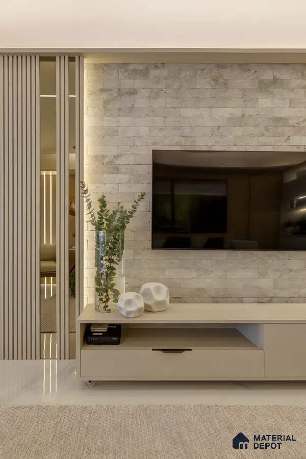 Neutral Stone Tile Tv Wall With Soft Lighting And Minimal Decor Accents | Material Depot