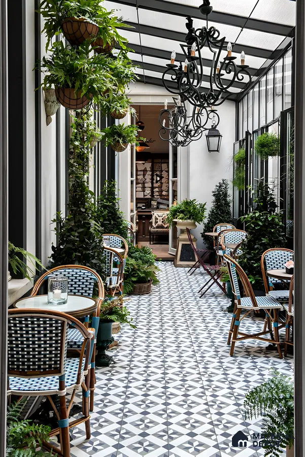 Parisian-Inspired Patio with Patterned Tiles and Greenery | Material Depot