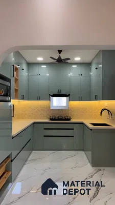 Pastel Green Charm: L-Shaped Kitchen With Moroccan-Inspired Backsplash And Marble Floors | Material Depot