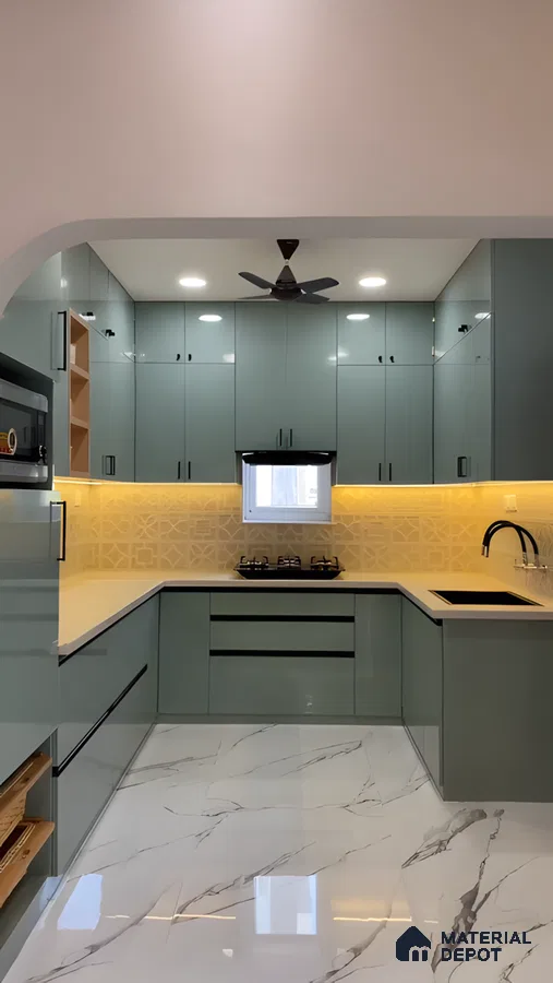 Pastel Green Charm: L-Shaped Kitchen With Moroccan-Inspired Backsplash And Marble Floors | Material Depot
