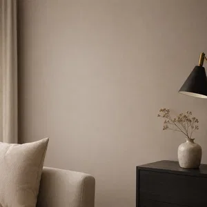 Plain beige textured wallpaper used in the Living Room