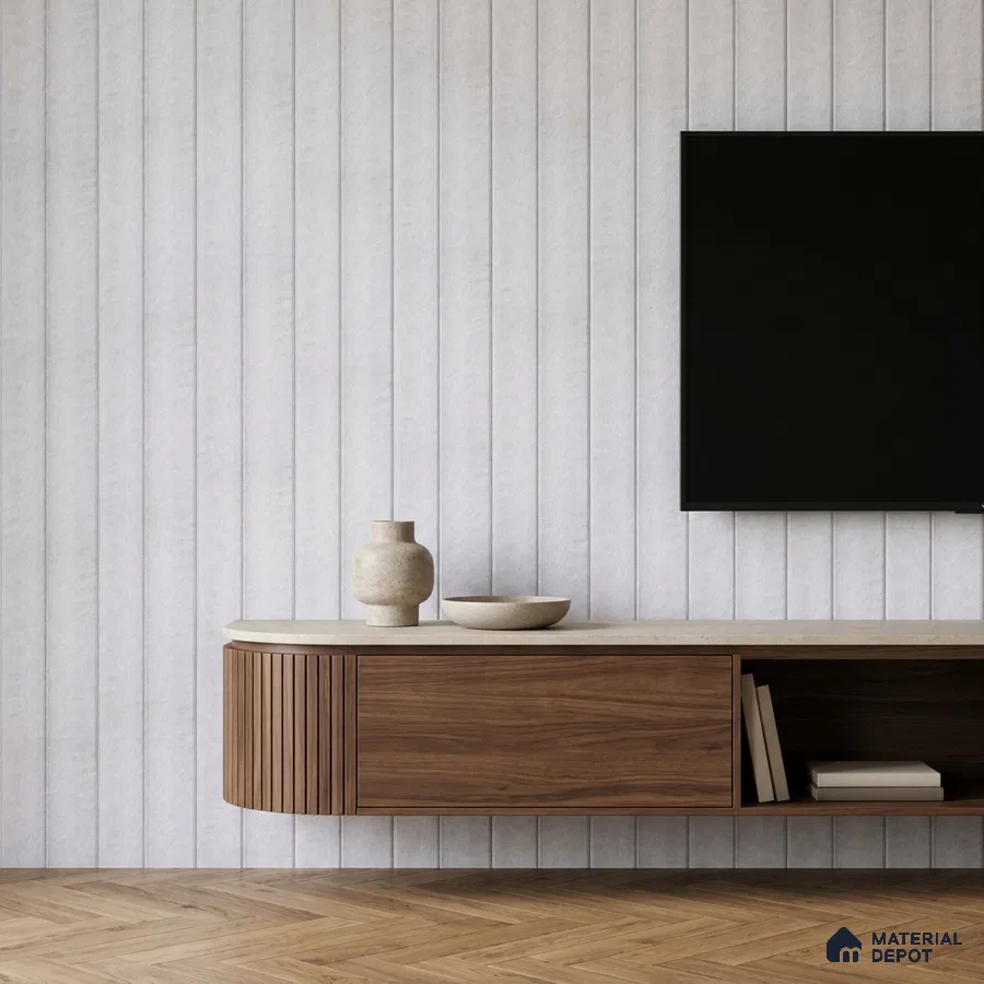 Minimalist TV unit with walnut wood laminate, white fluted wall panels, and herringbone wood flooring