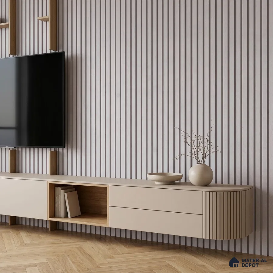 Minimalist TV unit with beige matte laminate, fluted wall panels, and light oak herringbone wooden flooring