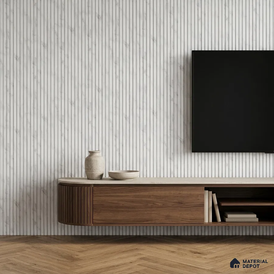 Minimalist TV unit with walnut wood laminate, marble-look fluted wall panels, and herringbone wooden flooring