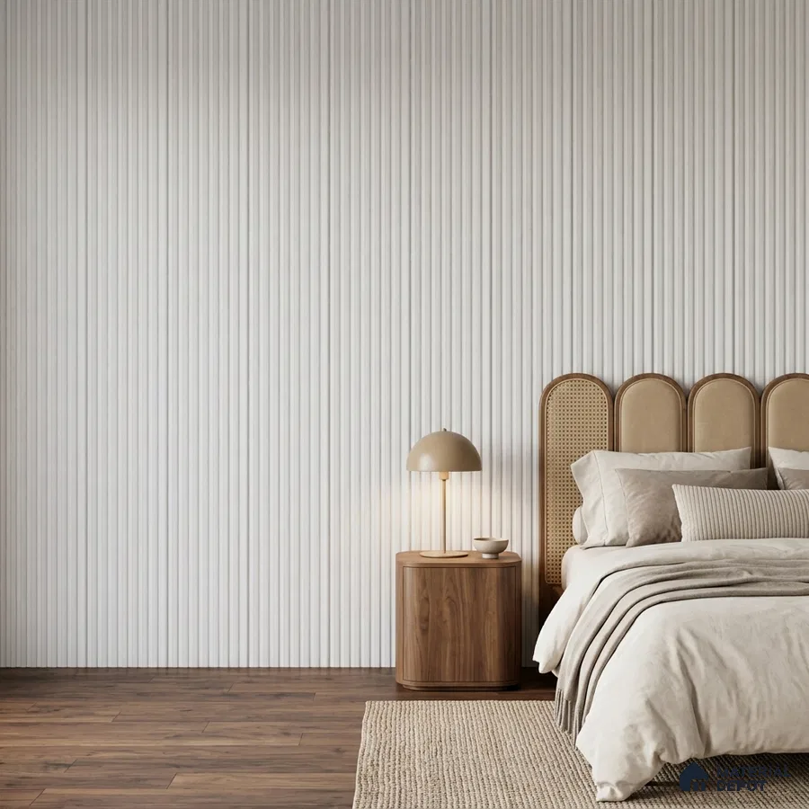 Japandi bedroom with beige fluted wall panels, cane headboard, and walnut wood flooring