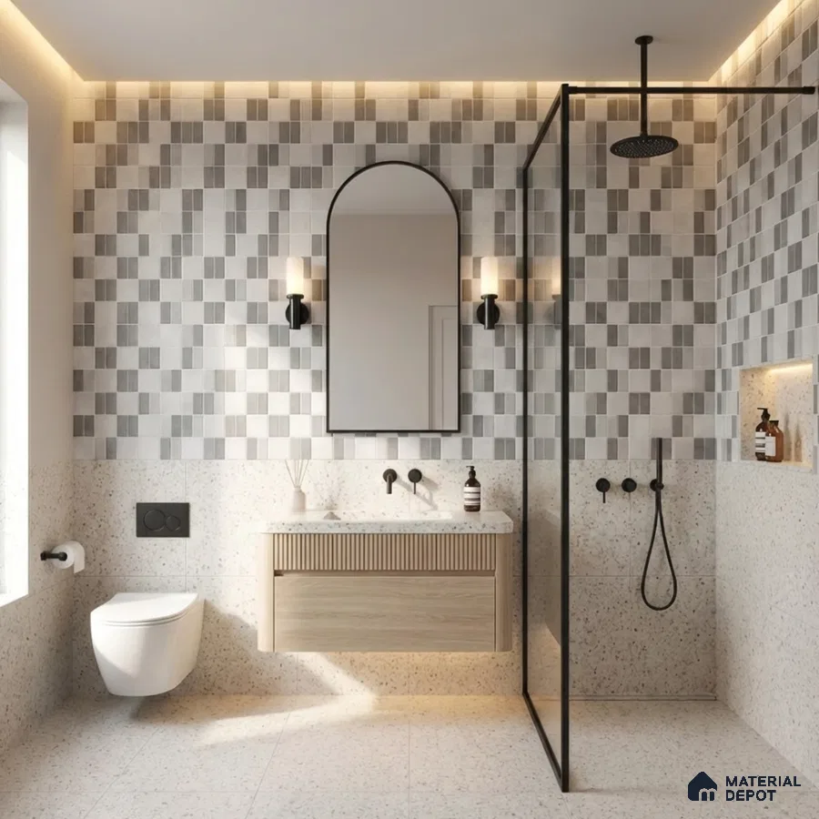 Scandinavian bathroom with terrazzo floor tiles, fluted wood vanity, and geometric grey wall tiles