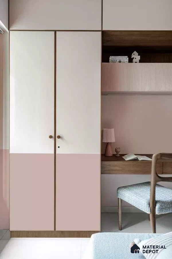 Scandinavian bedroom with pastel pink and white laminate wardrobe, fluted pastel laminate, and wooden study desk | Material Depot