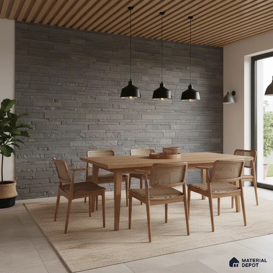 Scandinavian dining room with grey stone cladding wall and natural oak wood dining set in Bengaluru
