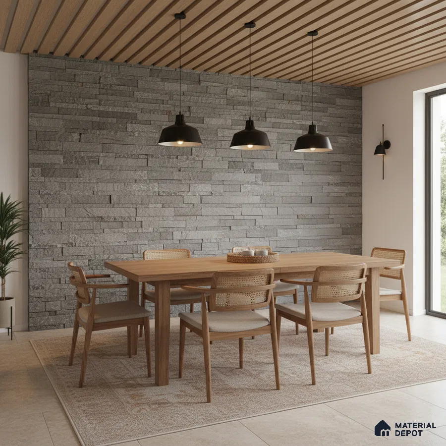 Scandinavian dining room with grey stone cladding wall and natural oak wood slat ceiling in Bengaluru