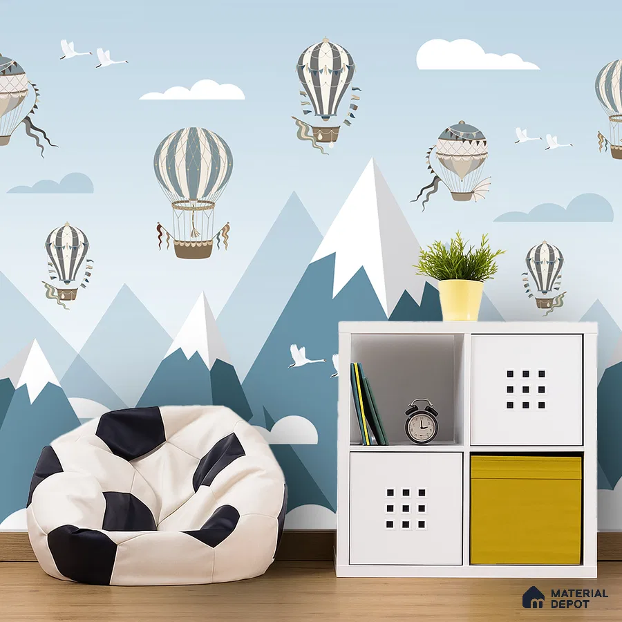 Scandinavian kids room with hot air balloon wallpaper, white modular storage, and soccer bean bag in Bengaluru