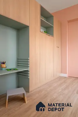 Scandinavian kids room with light oak laminate wardrobe, pastel green study nook, and peach wall paint | Material Depot