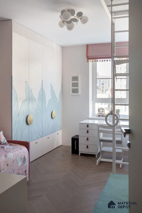 Scandinavian kids room with pastel blue leaf pattern wardrobe and herringbone wooden flooring | Material Depot