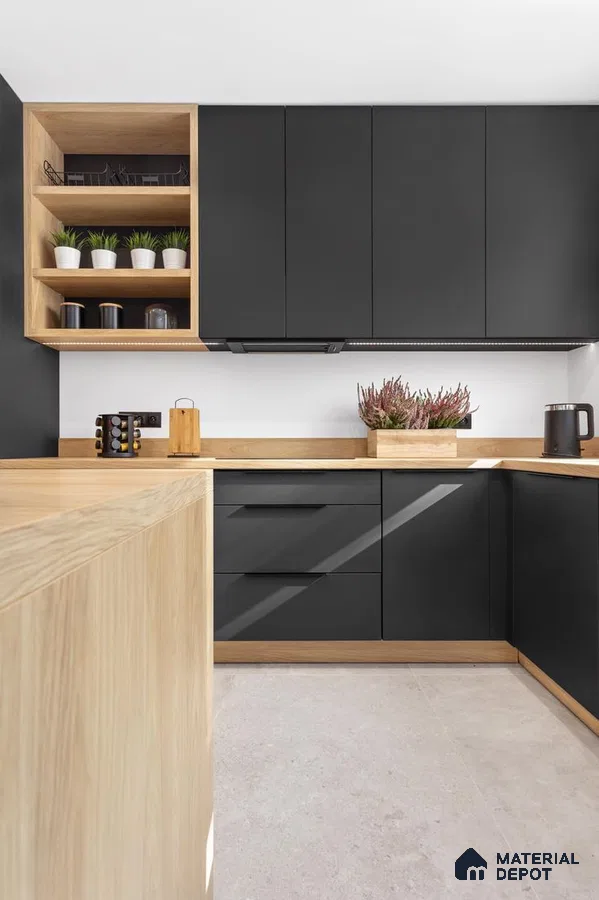 Scandinavian kitchen with matte black laminate cabinets and light oak wood laminate countertop in Bengaluru | Material Depot