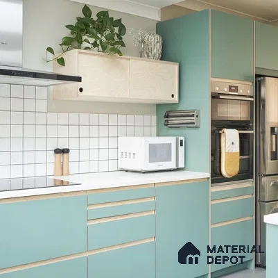 Scandinavian kitchen with pastel green laminate cabinets, birch wood accents, and white quartz countertop in Bengaluru | Material Depot