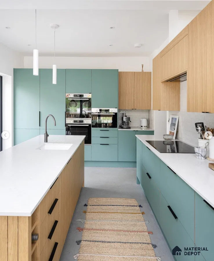 Scandinavian kitchen with pastel teal laminate, light oak wood laminate, and white quartz countertop in Bengaluru | Material Depot