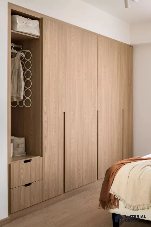 Scandinavian wardrobe with light oak wood laminate and minimalist built-in storage in bedroom | Material Depot