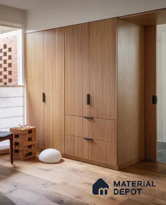 Scandinavian wardrobe with oak fluted laminate shutters and natural wood flooring | Material Depot