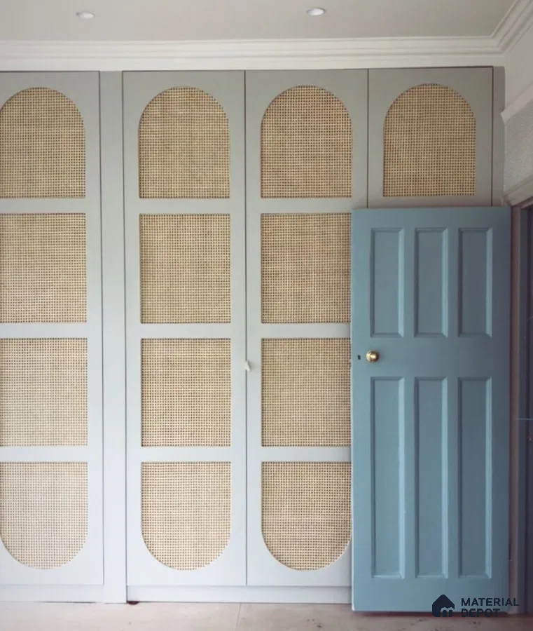 Scandinavian wardrobe with pastel blue frame and natural cane shutters | Material Depot