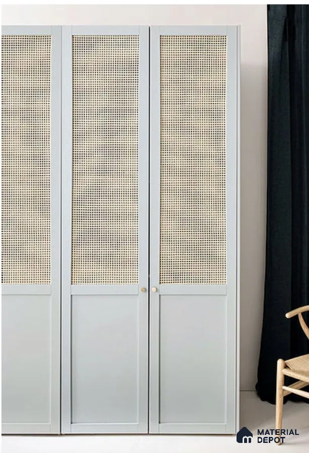 Scandinavian wardrobe with pastel blue laminate and natural cane panel shutters | Material Depot