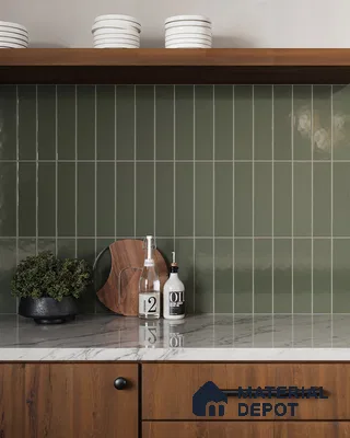 Serene Green Tiled Backsplash Kitchen with Warm Wood Cabinets and Marble Countertops | Material Depot