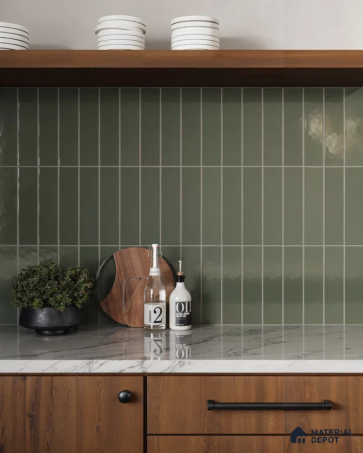Serene Green Tiled Backsplash Kitchen with Warm Wood Cabinets and Marble Countertops | Material Depot