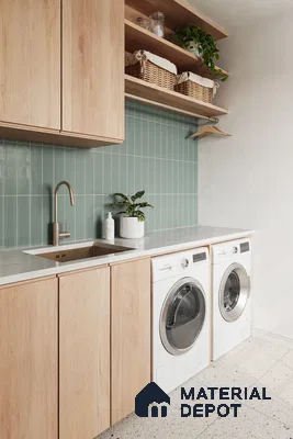 Serene Green Tiled Laundry Room with Wood Cabinets and Terrazzo Floor | Material Depot