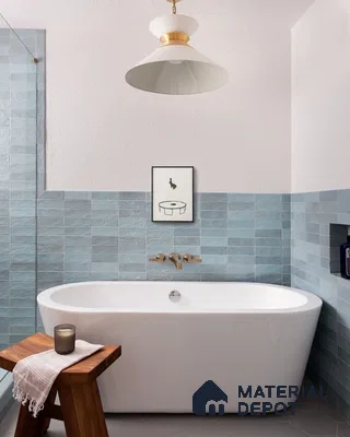 Serene Minimalist Bathroom with Blue Tile Accent Wall and Freestanding Tub | Material Depot