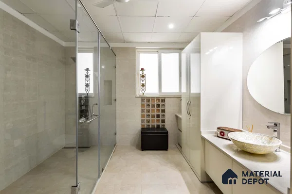 Sleek Bathroom with Large Vanity and Circular Mirror