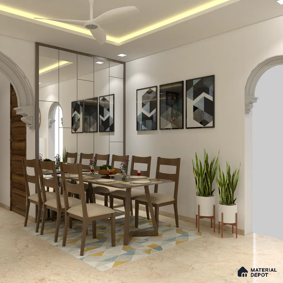 A dining room with a wooden table and chairs, a chandelier, and black and white paintings on the walls
