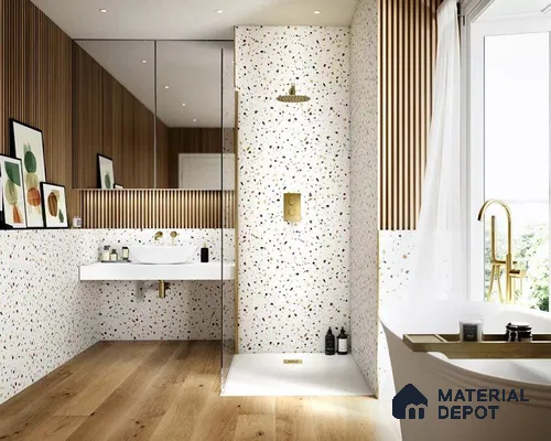 Stylish and Contemporary Bathroom Design Featuring Terrazzo Walls and Elegant Gold Accents | Material Depot