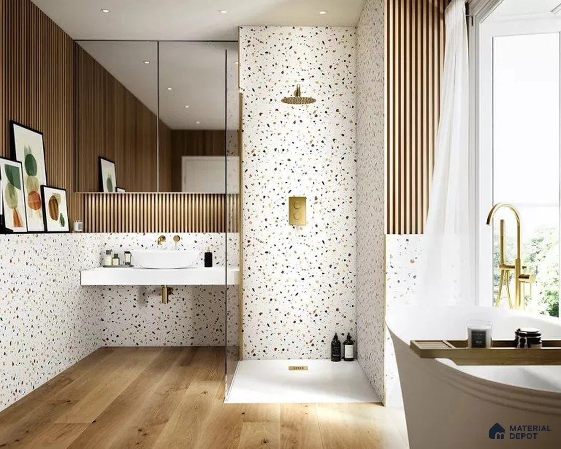 Stylish and Contemporary Bathroom Design Featuring Terrazzo Walls and Elegant Gold Accents | Material Depot
