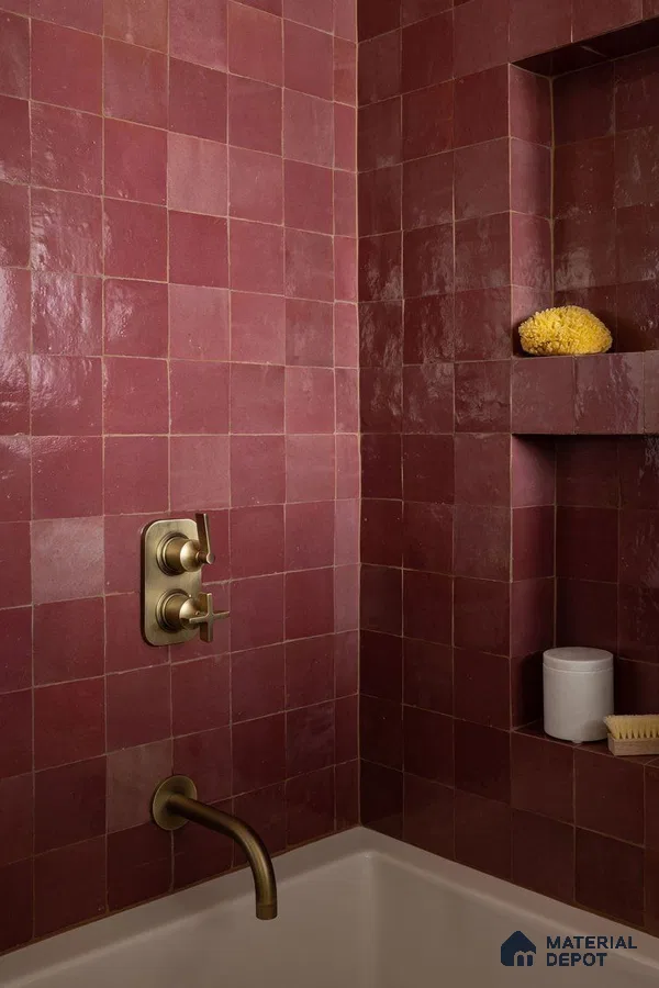 Stylish Bathtub with Rich Burgundy Tiles and Elegant Fixtures | Material Depot
