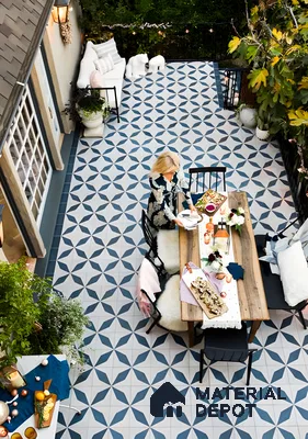 Stylish Patio with Patterned Tiles and Outdoor Dining Area | Material Depot
