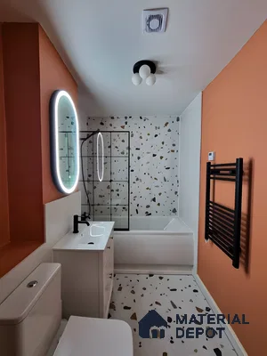 Stylish Restroom Interior with Patterned Shower Tiles and Sleek Fixtures | Material Depot